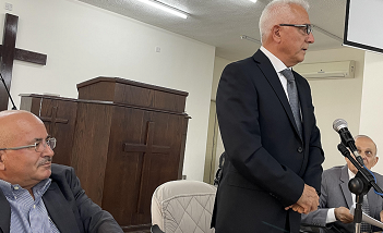Rev. Habes Nimat to the right and Imad Mayaa to the left